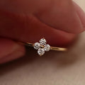 Champagne copper adjustable ring with four-leaf clover and rhinestone flower detail