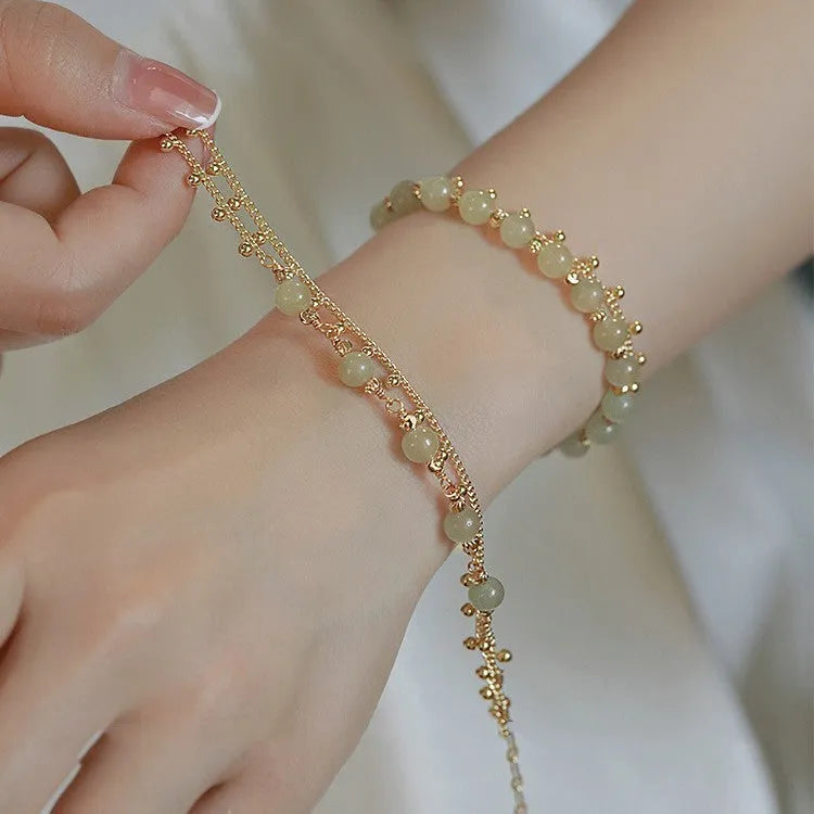 Escape Princess Natural Hetian Jade Bracelet showing beaded design with Princess Running elements