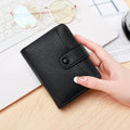 Ladies short wallet with lychee pattern in two-fold PU leather construction