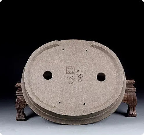 Handmade antique oval purple sand clay bonsai pot showing shallow 25cm length and 21cm width.