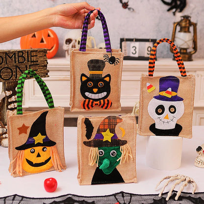 Halloween candy tote bag for kids featuring fun witch, skull, pumpkin, and black cat designs