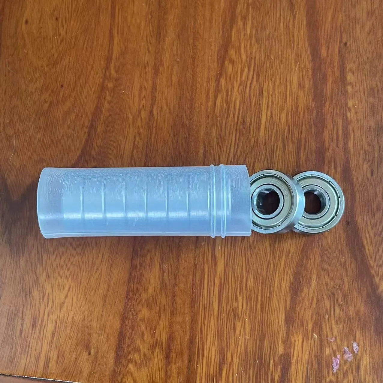 6000zz carbon steel miniature ball bearing showing 10mm inner diameter and 26mm outer diameter.
