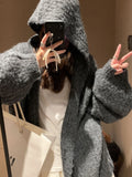 Women's dark grey retro-style hooded sweater cardigan on a hanger.