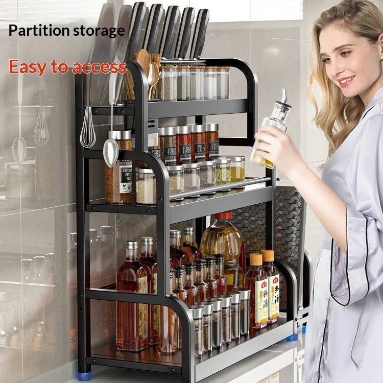 Carbon steel kitchen floor storage rack with knife holder, chopsticks holder, cutting board holder, and six hooks in a modern style