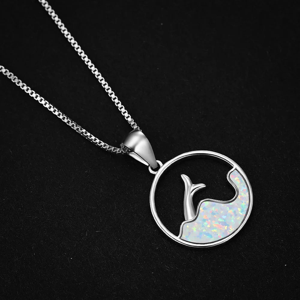 White gold electroplated necklace with geometric sea fishtail pendant featuring round blue opal stone