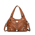 Women's large capacity washed leather handbag in soft PU, black colour, with slit pocket and sewn thread detailing