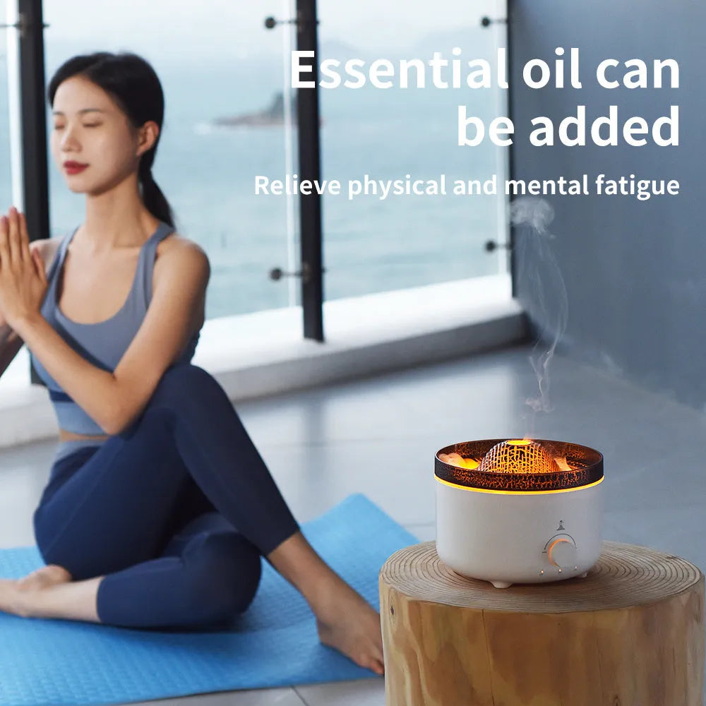 Small white volcano-shaped humidifier with simulated flame lighting and remote control