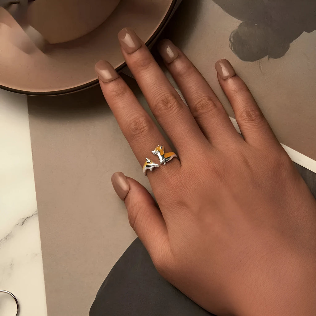 Cartoon corgi dog design on a silver plated women's ring.