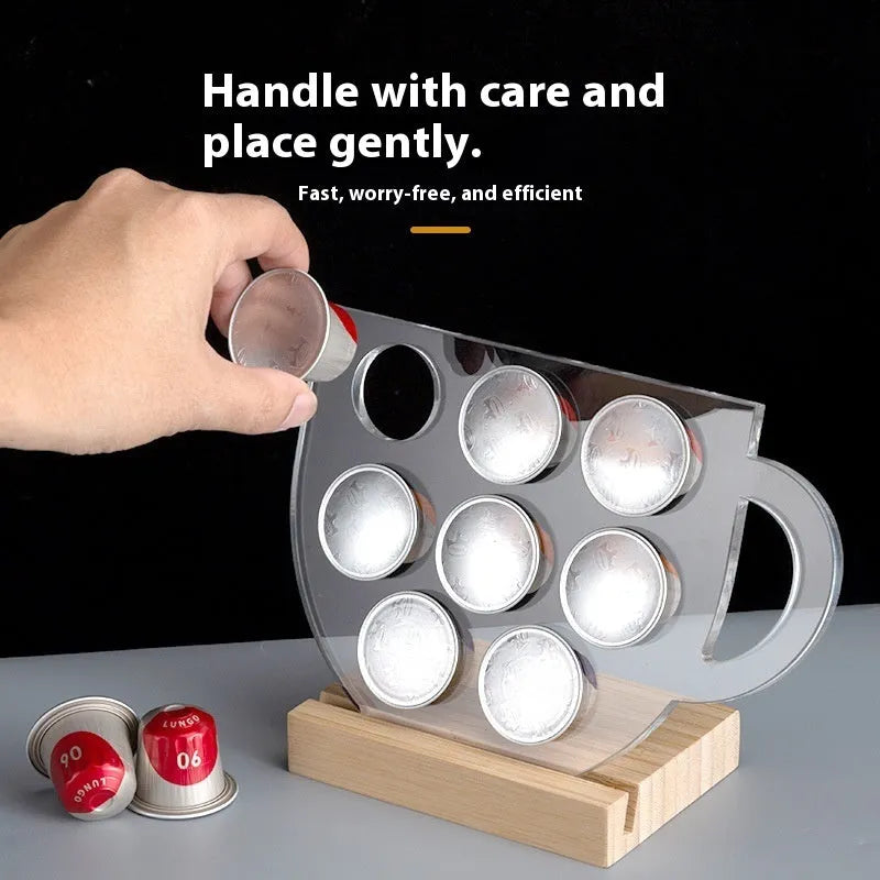 Acrylic rotatable coffee capsule storage rack in solid colour with capsules on a modern kitchen counter