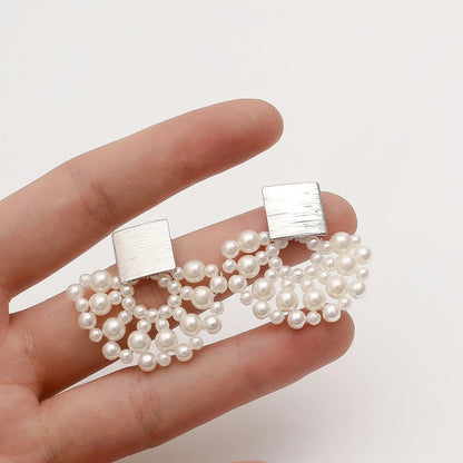 Handmade pearl woven scalloped pearl stud earrings in 14K true gold