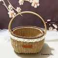 Coffee brown straw basket with hand-woven hemp rope detailing, shown on a wooden table.