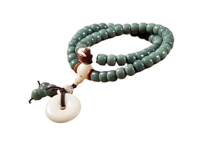 White jade Bodhi seed and green sandalwood Buddhist bracelet with double ring safety buckle and lotus charm