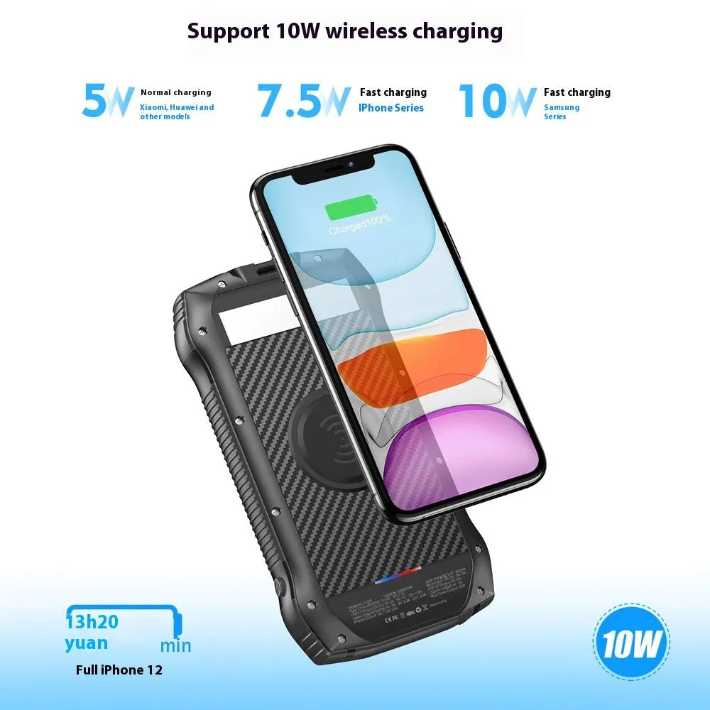 Portable 33500mAh solar power bank with waterproof plastic shell and LED light in black and orange colour