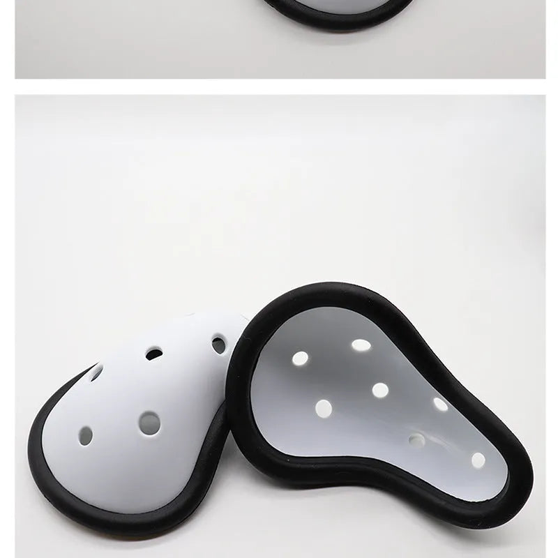 Black rubber sports genital protector for adult and child sizes used in hockey, rugby, and martial arts.