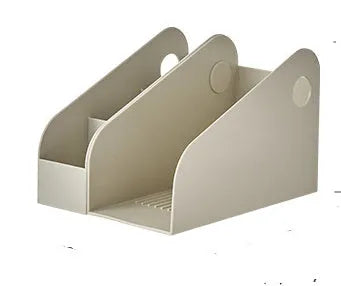 Plastic desktop storage box with two grids in milk coffee colour on a wooden desk.
