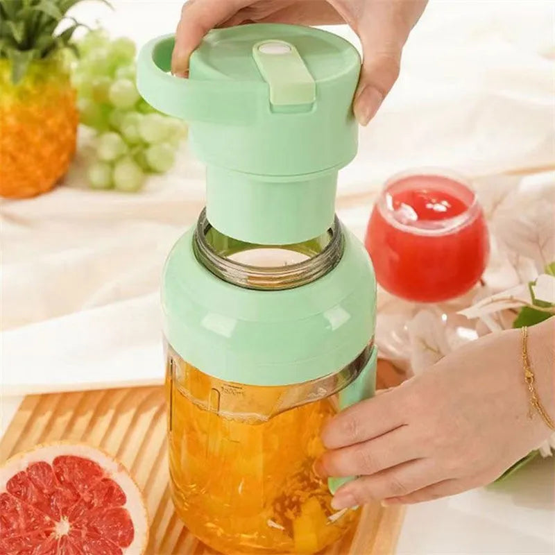 Portable electric juicer blender with 1500ml capacity, USB charging port, and eight steel blades