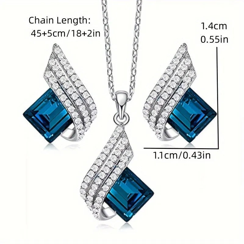 Women's alloy pendant necklace and matching stud earrings set with cross chain and glass accents