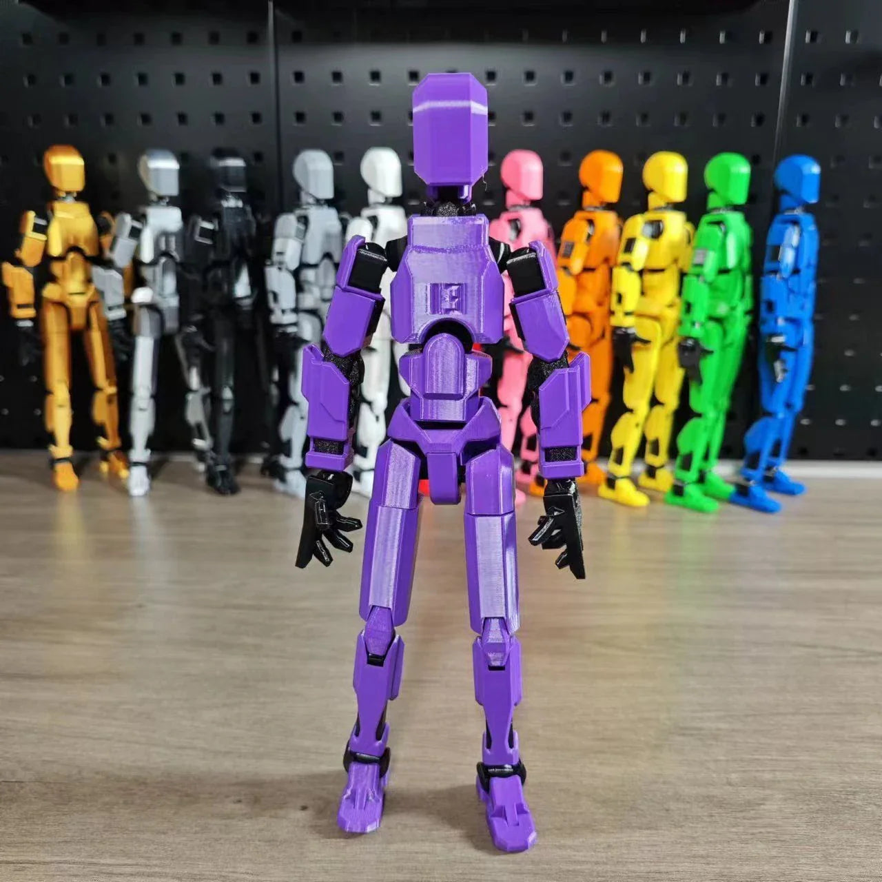 Customizable 3D printed robot mannequin with posable joints for creative expression, illustration, desk decor, and unique gifting.