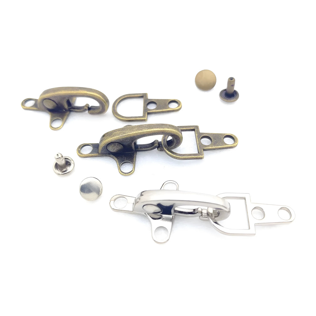 Zinc alloy aircraft-shaped hanging buckle in metallic finish, shown next to a ruler indicating 5.85cm size.