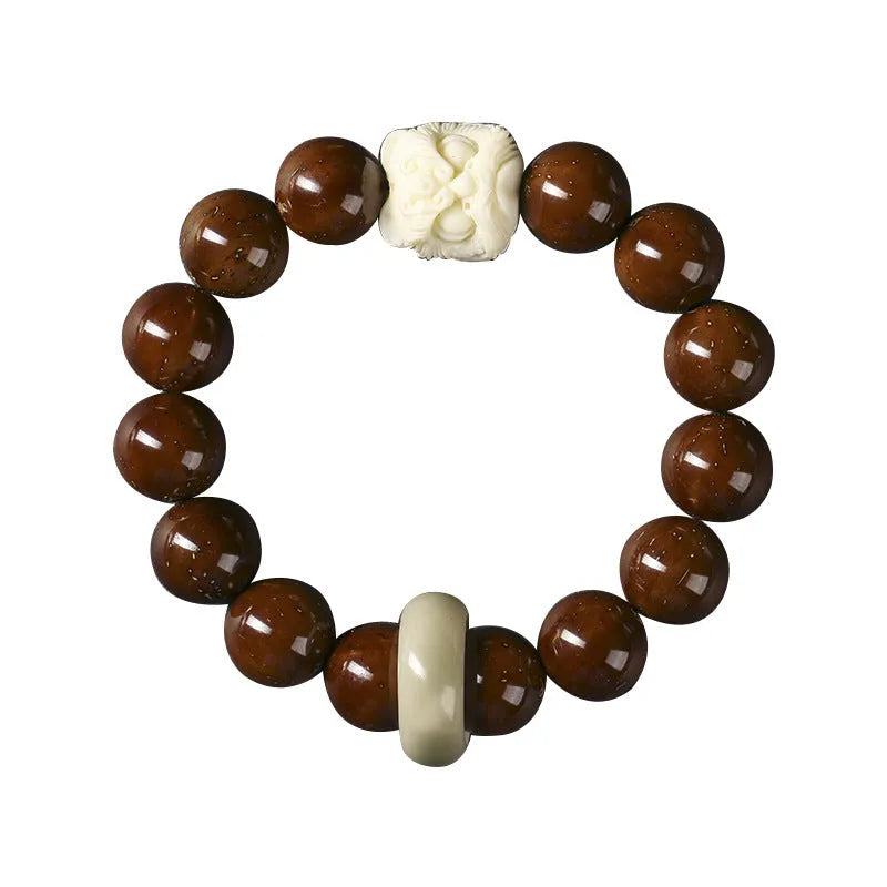 Ivory nut lion style round bead bracelet with 13mm natural seed beads in hand-woven construction