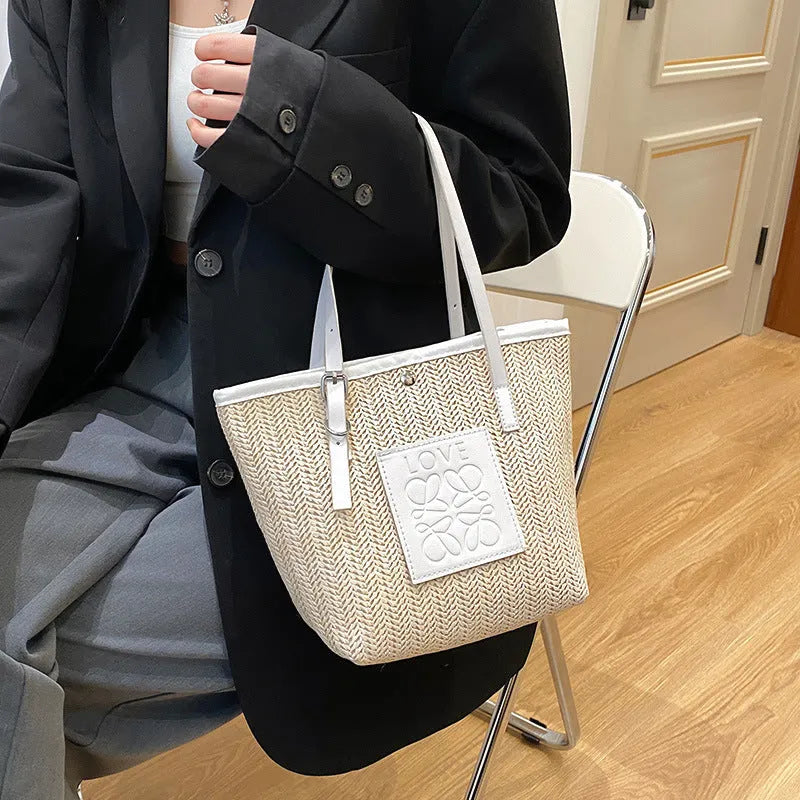 Women's straw woven shoulder bag in European retro style with three-dimensional pockets