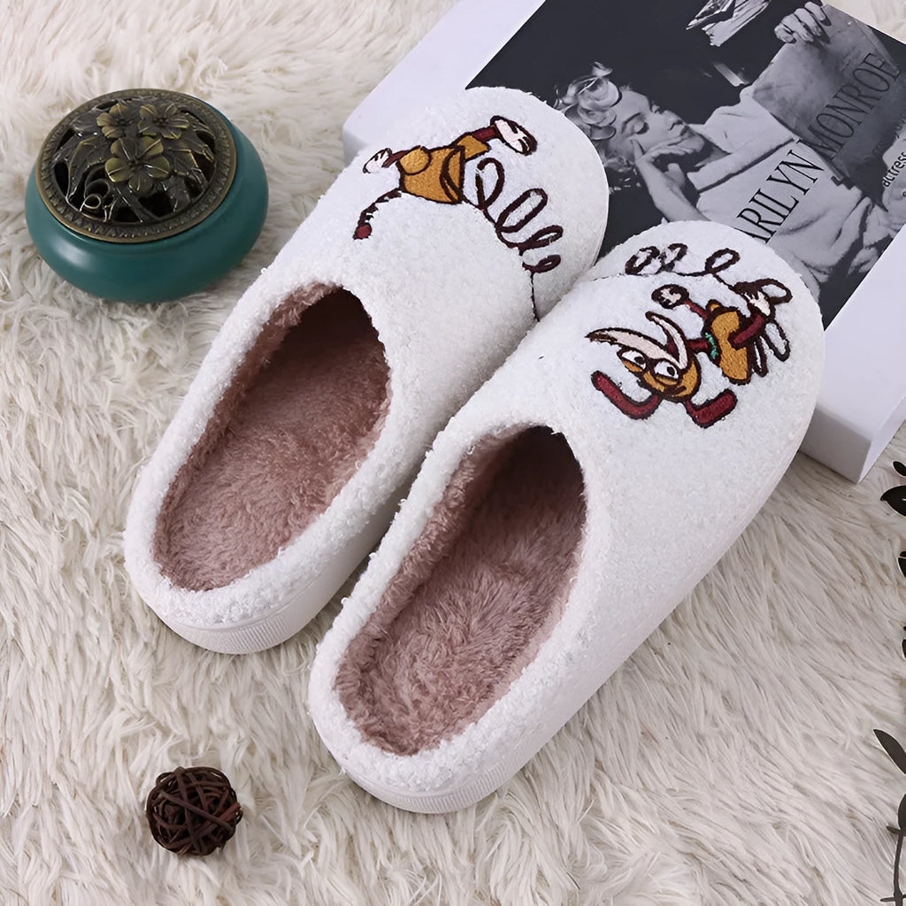 White cartoon pattern fluffy slippers with a plush upper and a non-slip rubber sole.