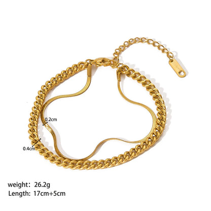 Stainless steel ornament bracelet with real gold treatment in various colours
