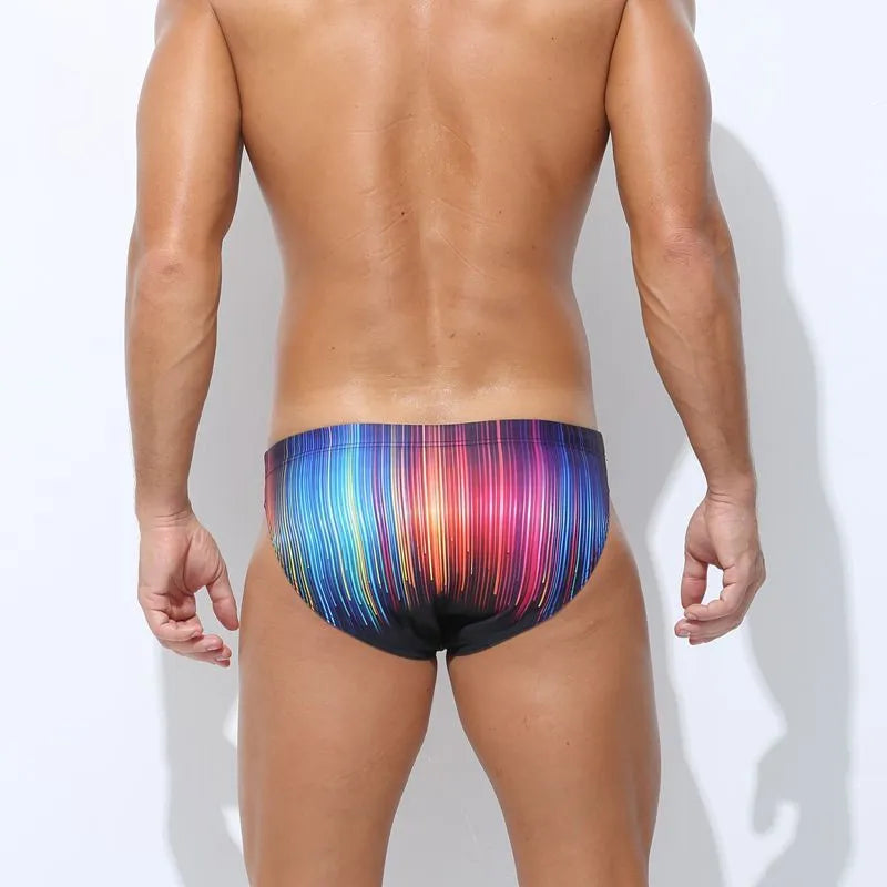 Men's printed swimming trunks in polyester available in Cyber, Ice Cream, Streamer, and Skull patterns