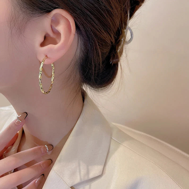 Geometric alloy earrings in gold and silver finishes