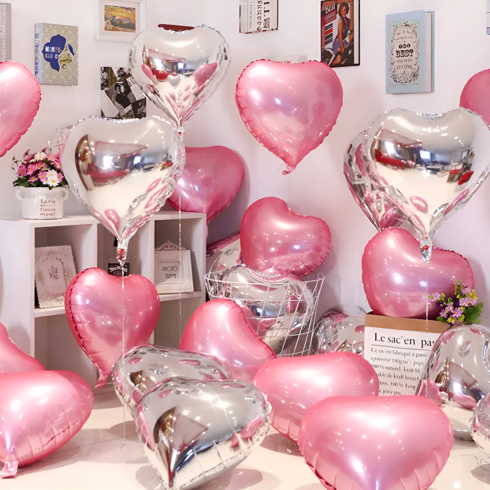 Five peach heart-shaped metallic aluminium balloons in assorted colours on a white background.