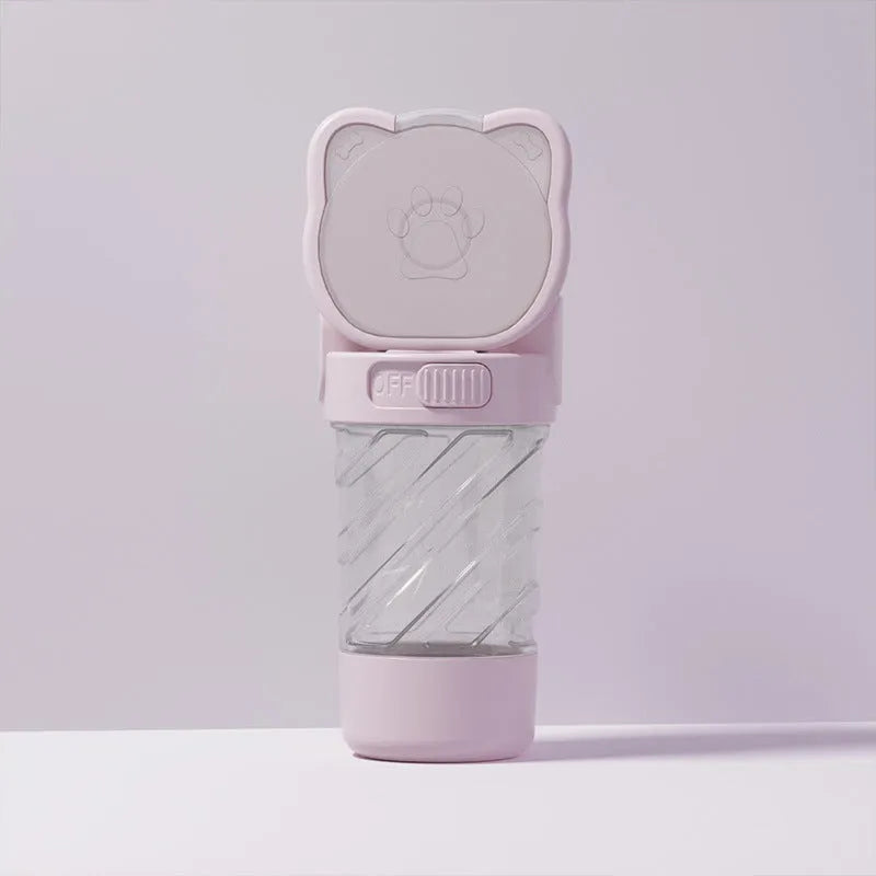 Green, pink, or white 3-in-1 portable pet water bottle with food container and garbage bag dispenser and shoulder strap.