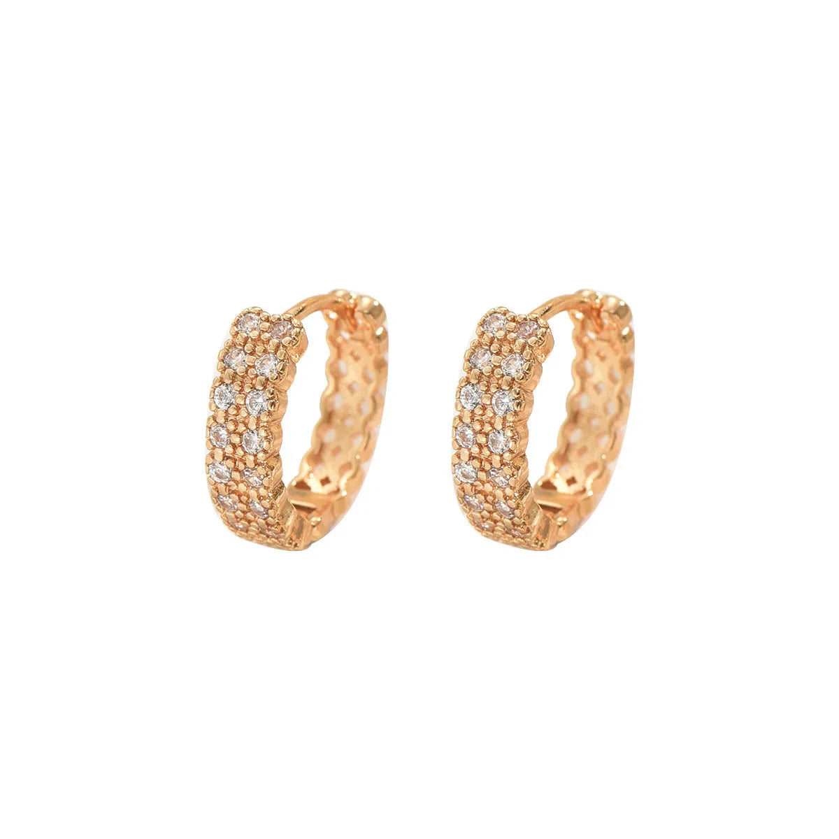 Copper geometry pattern ear studs with round, dot, and ring elements.