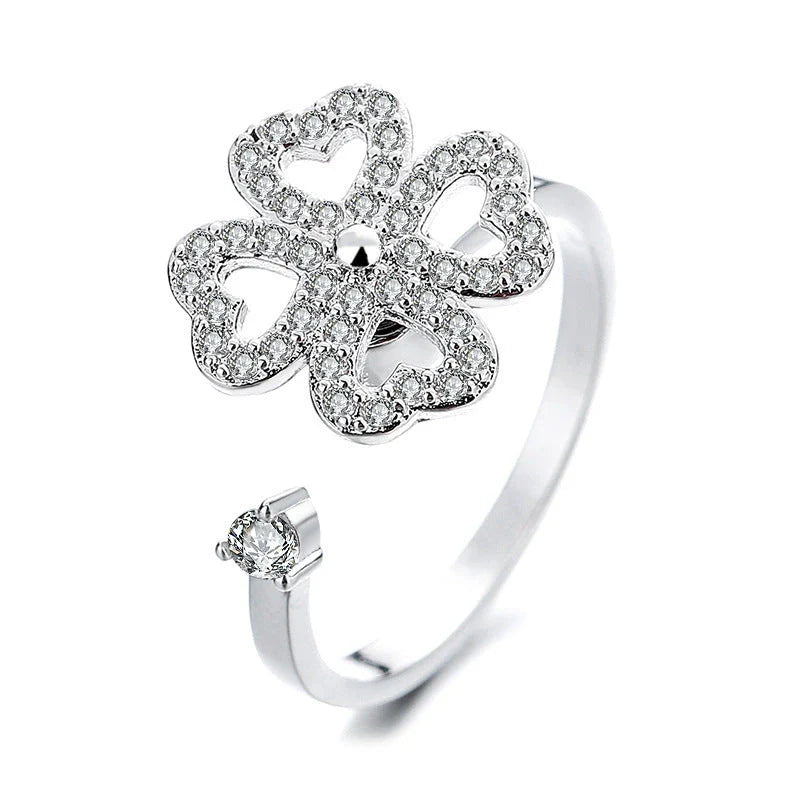 Adjustable rotating spinner ring with elegant flower and bee design in various color options