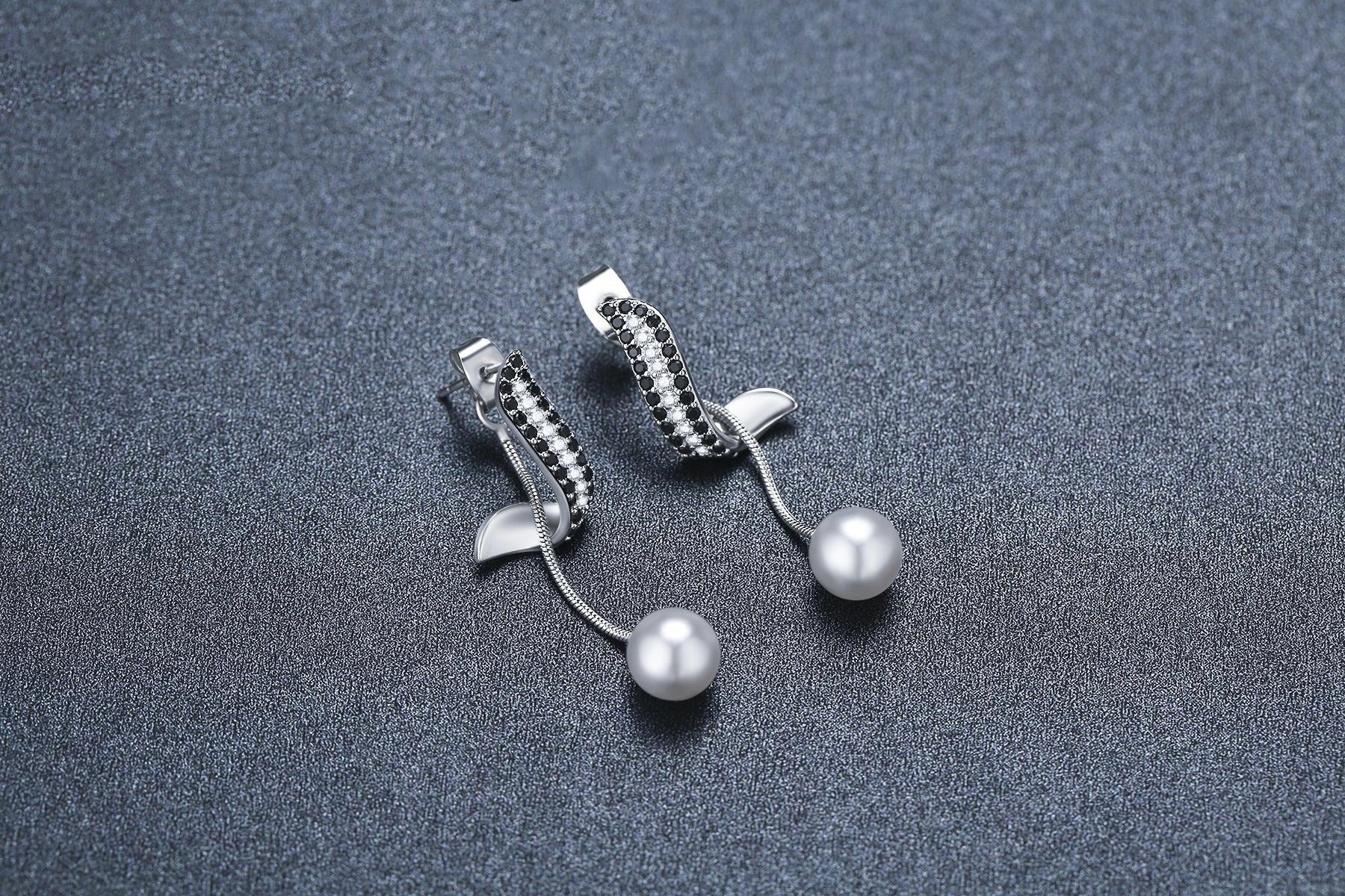 Black pearl pendant tassel earrings with copper finish, elegant women's jewelry