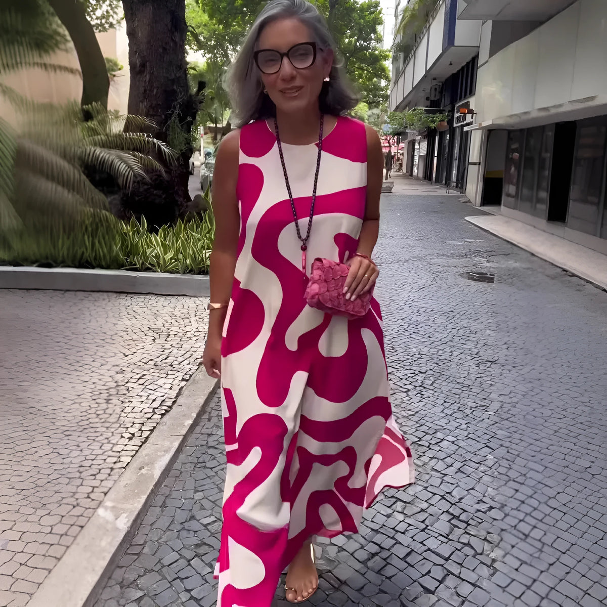 V-neck printed sleeveless A-line dress in Rose Red with abstract pattern, suitable for commuting and casual wear
