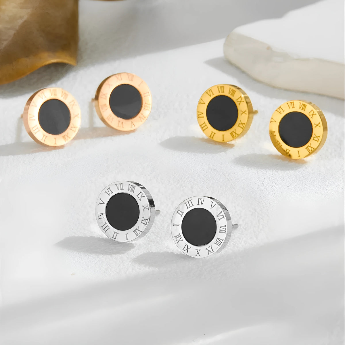 Titanium steel Roman stud earrings for men in gold finish, geometric round shape