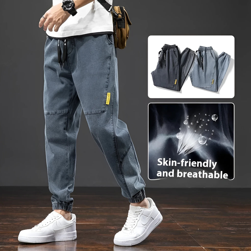 Men's loose fit cargo casual jeans in blue, showing straight leg and Korean style design.