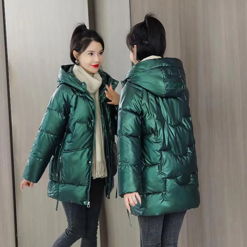 Women's loose thick hooded winter jacket in black, shown on a hanger.
