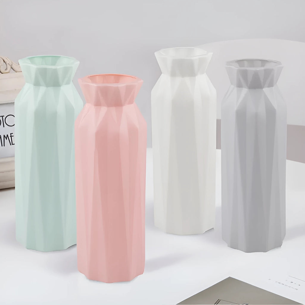 A sturdy green melamine vase with a wide 7.2cm base on a wooden surface.