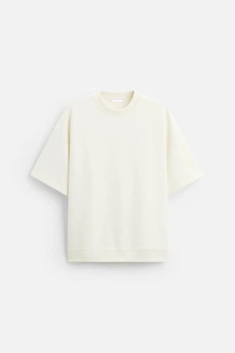 Loose fit short sleeve t-shirt and matching shorts set in blue, shown on a hanger