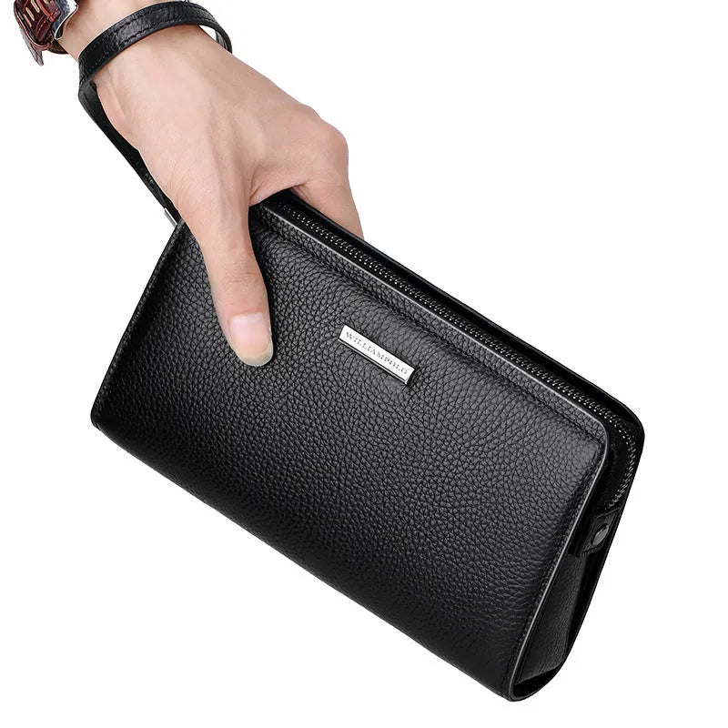 Men's black genuine leather wallet clutch open showing multiple card slots and compartments