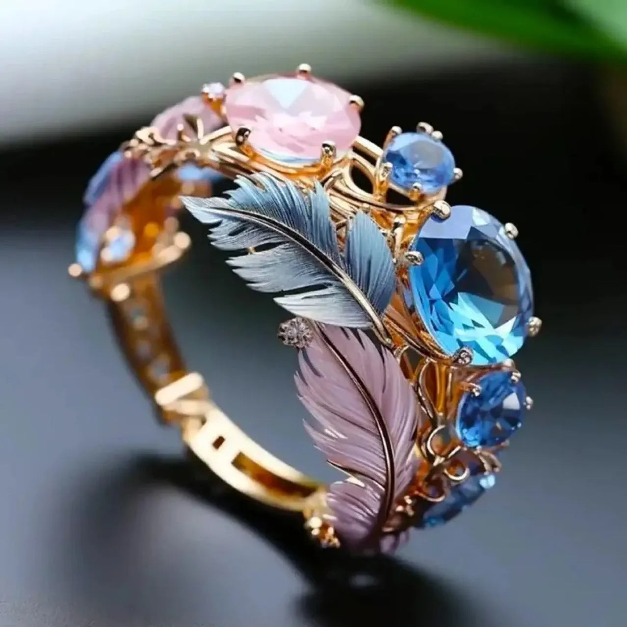Gold brass feather ring with geometric design and zircon detailing
