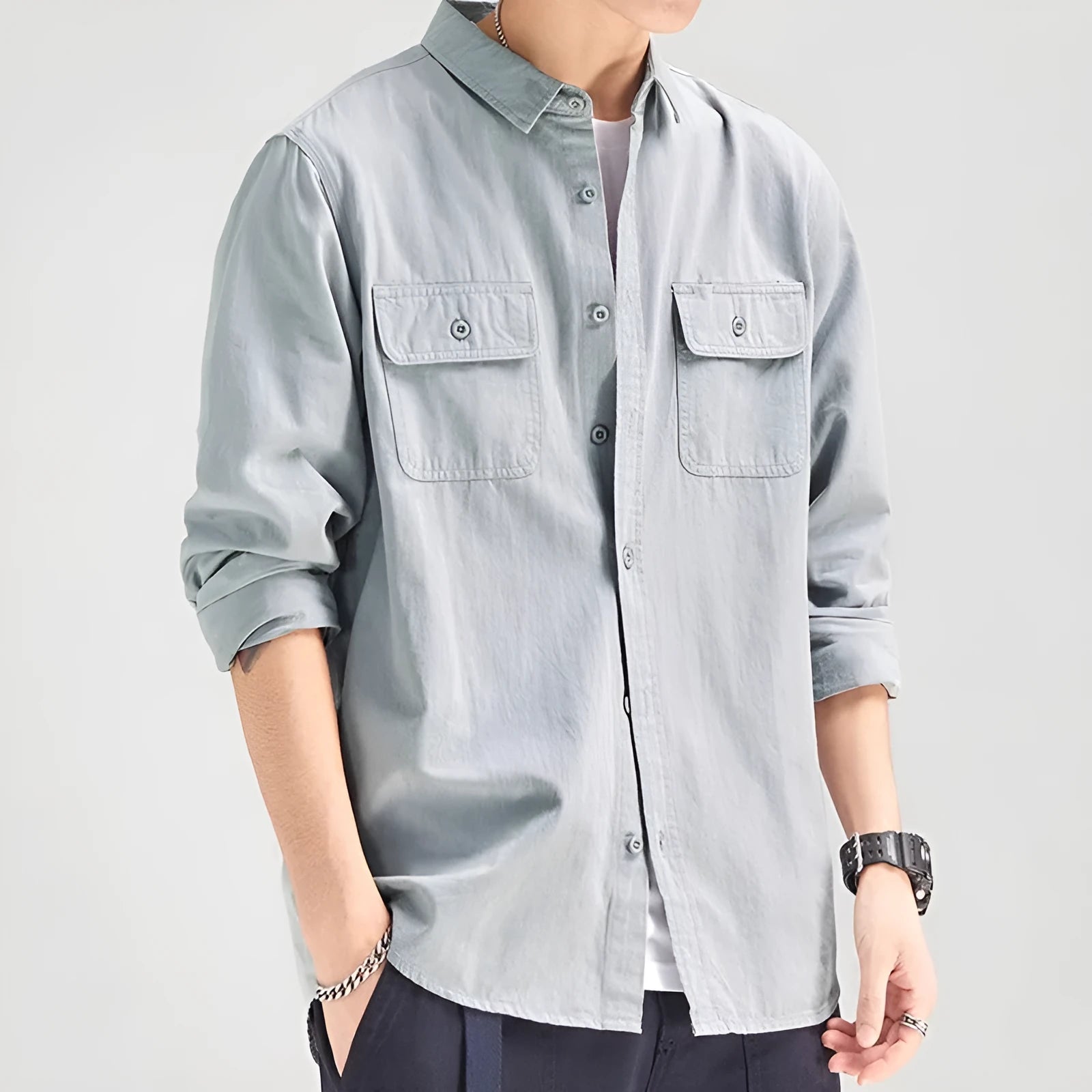 Man's loose fitting long sleeve cardigan shirt in light grey, black, khaki, or green.
