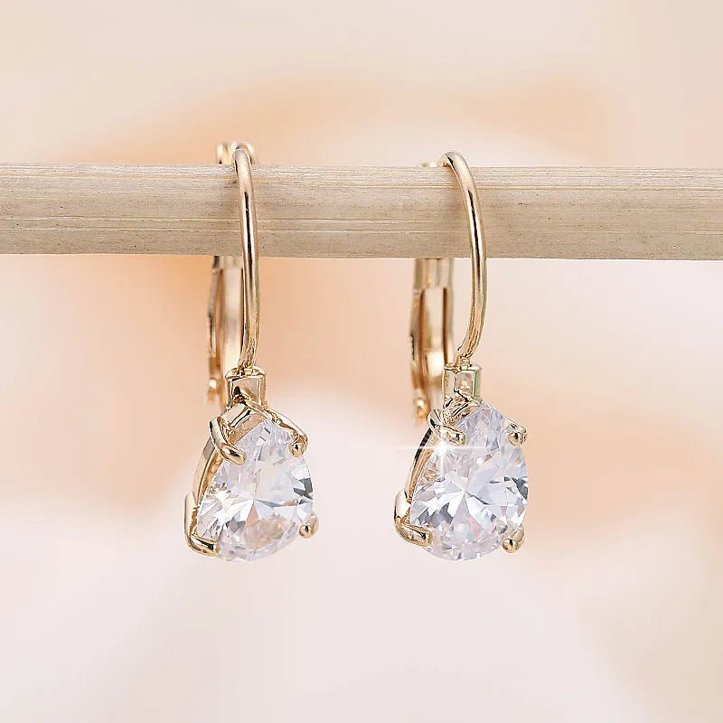 Women's drop-shaped copper earrings with gold or platinum plating options
