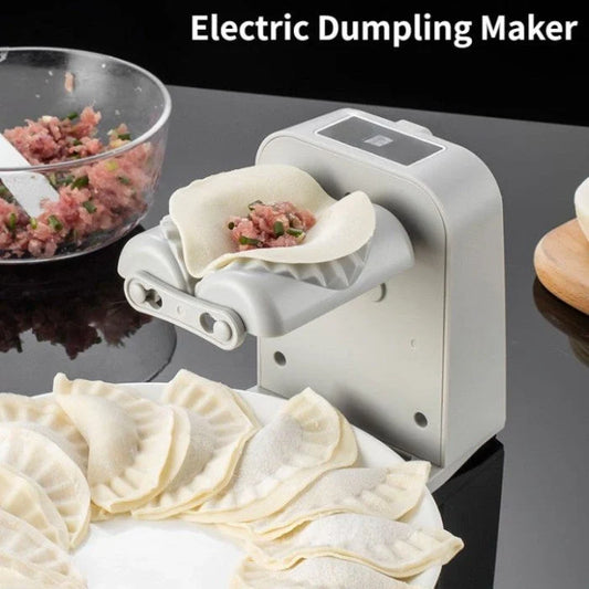 Electric Dumpling Maker Machine on kitchen counter with dumplings