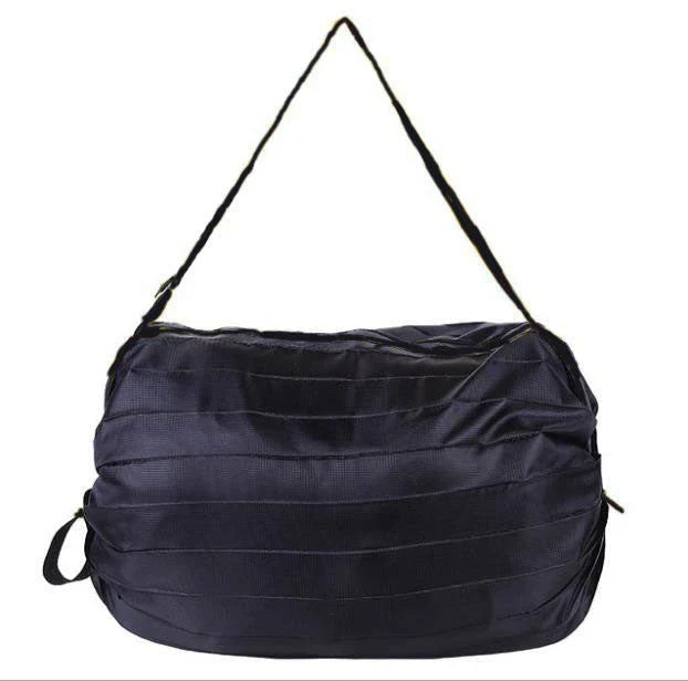 Foldable tote bag made of durable 210D Oxford cloth, featuring a versatile design that transitions from compact to spacious for everyday use in the United States