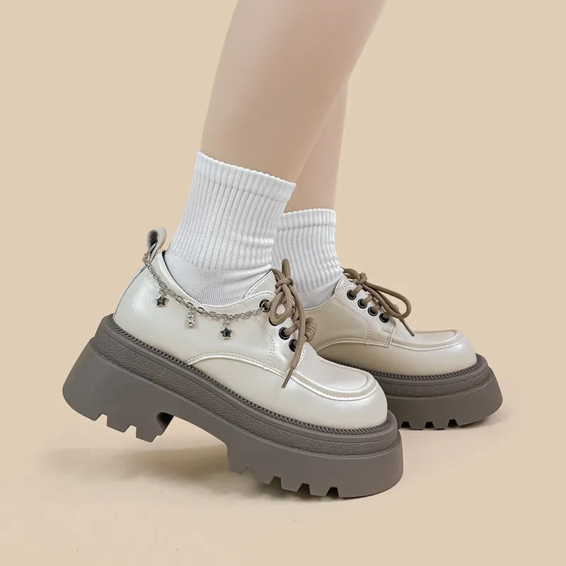 White XINGX Bear colour platform Mary Jane shoes with thick chunky heel and front lace-up.