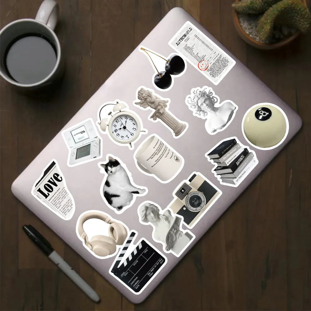 61 black and white waterproof PVC vinyl stickers for laptop and drink bottle personalisation.