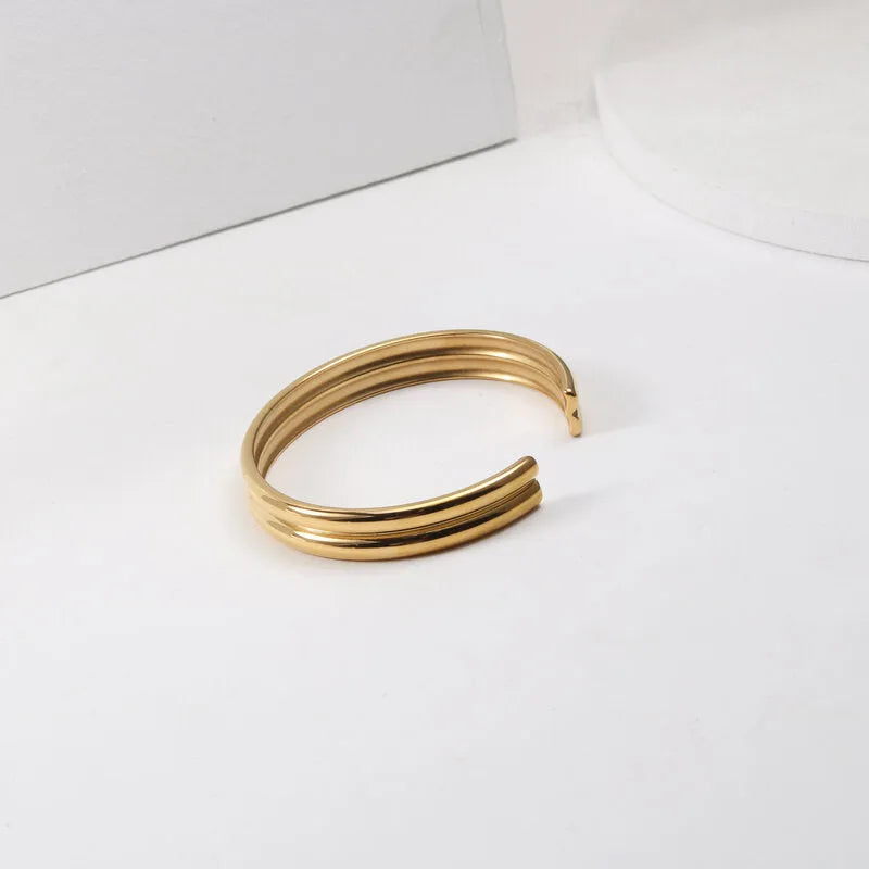 Gold double curved titanium steel bracelet with inlaid pearls geometric women's accessory