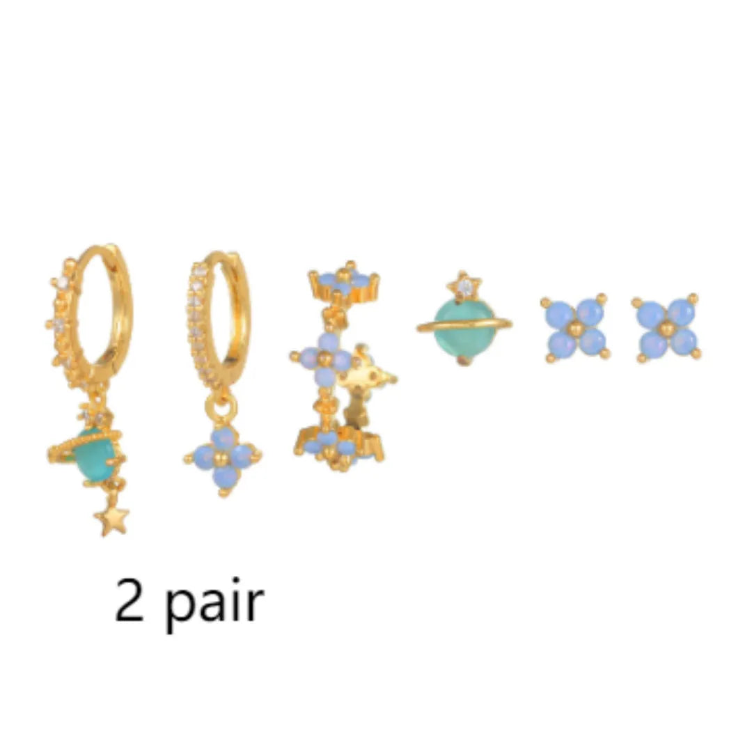 Gold and silver flower stud earrings with blue protein flower nail and zircon mosaic design.